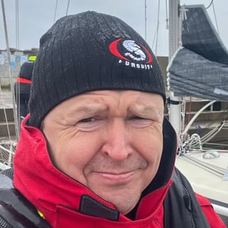 Andres Kepler on a sailing boat in harbour